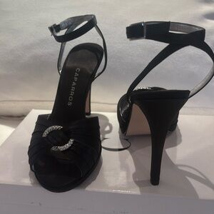 Caparros open toe sling-back with crystal circle on front